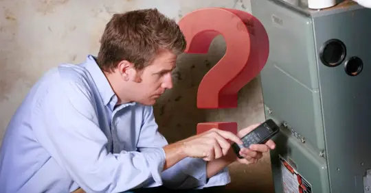 man figuring out what to do with his furnace