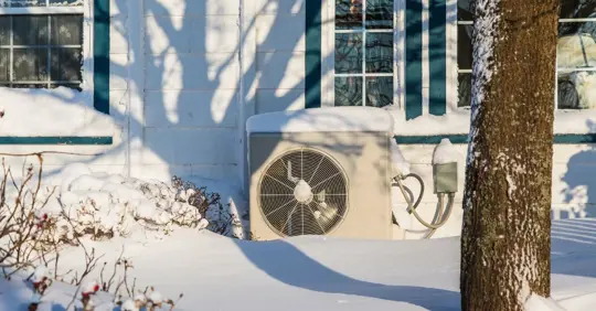 Outdoor heat pump unit during winter